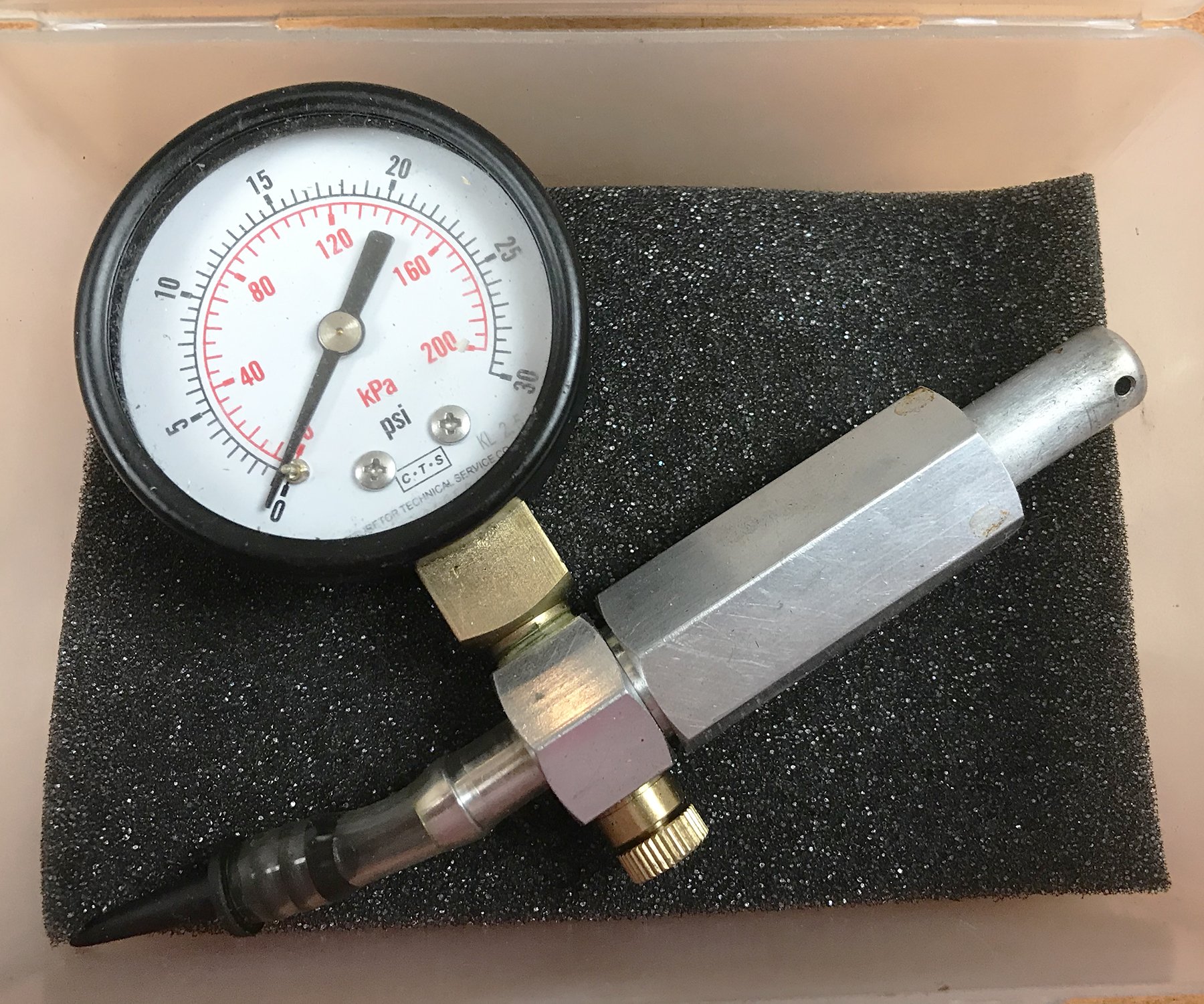 PO-4jpg Get a good pressure check gauge. If you run 2-strokes, you’ll need it often. I found this one on the internet for about $35.